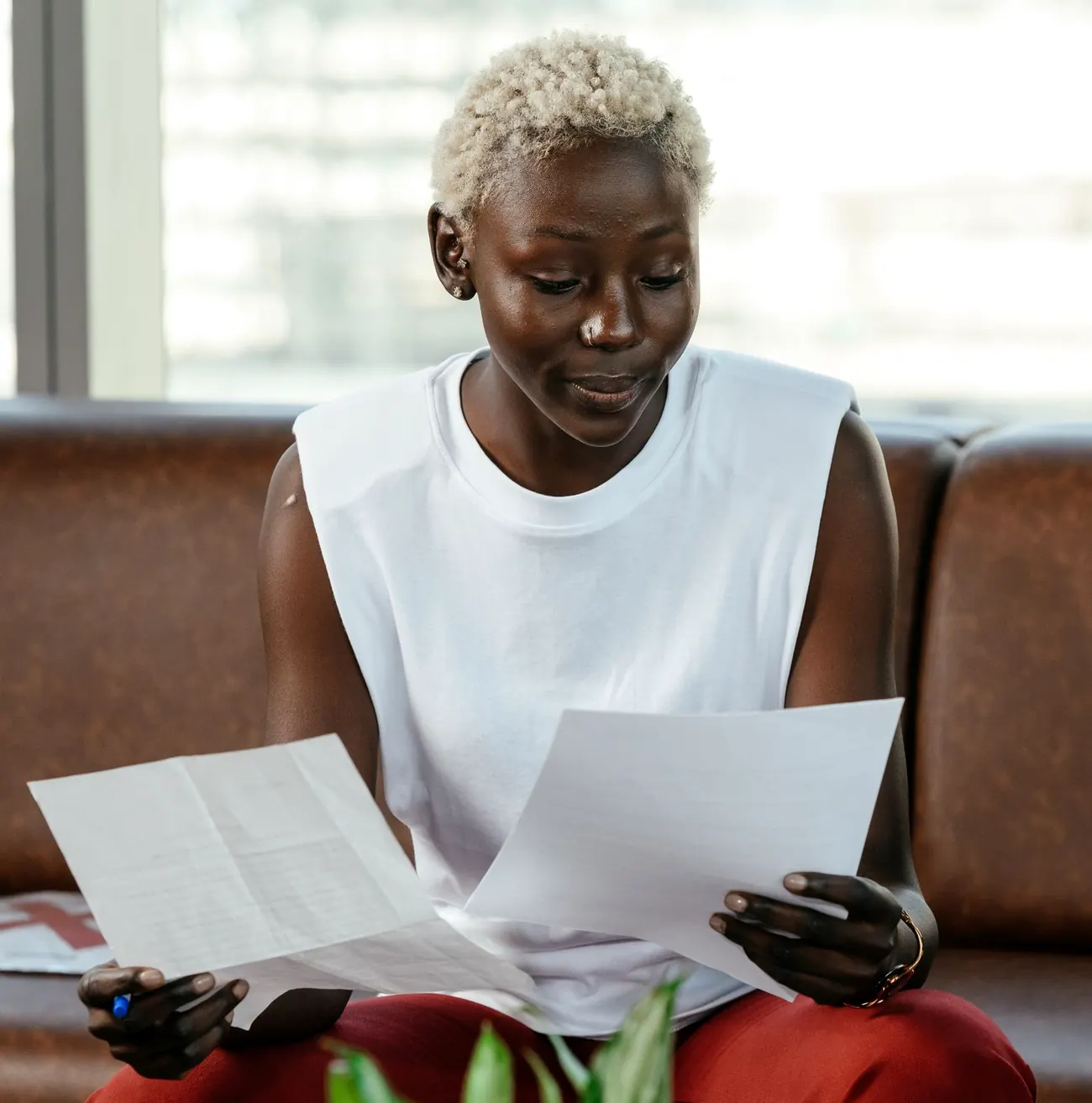 Tenant comparing her move-in and move-out reports side by side